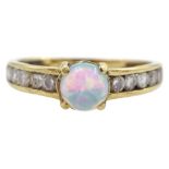 9ct gold opal solitaire ring with cubic zirconia set shoulders