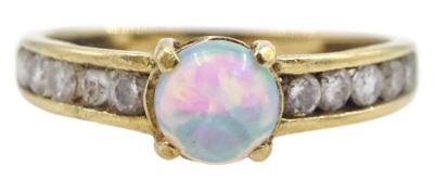 9ct gold opal solitaire ring with cubic zirconia set shoulders