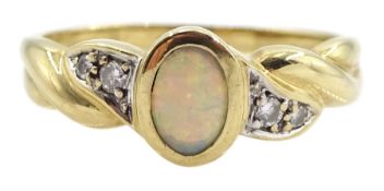 9ct gold bezel set opal ring with diamond chip set shoulders