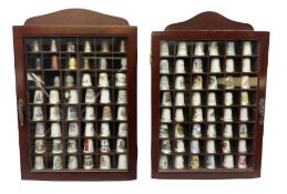 Collection of thimbles to include two stamped silver examples