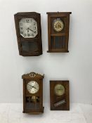 Three striking wall clocks and one wall barometer