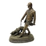 Bronzed figure of a huntsman with hound signed Tupton