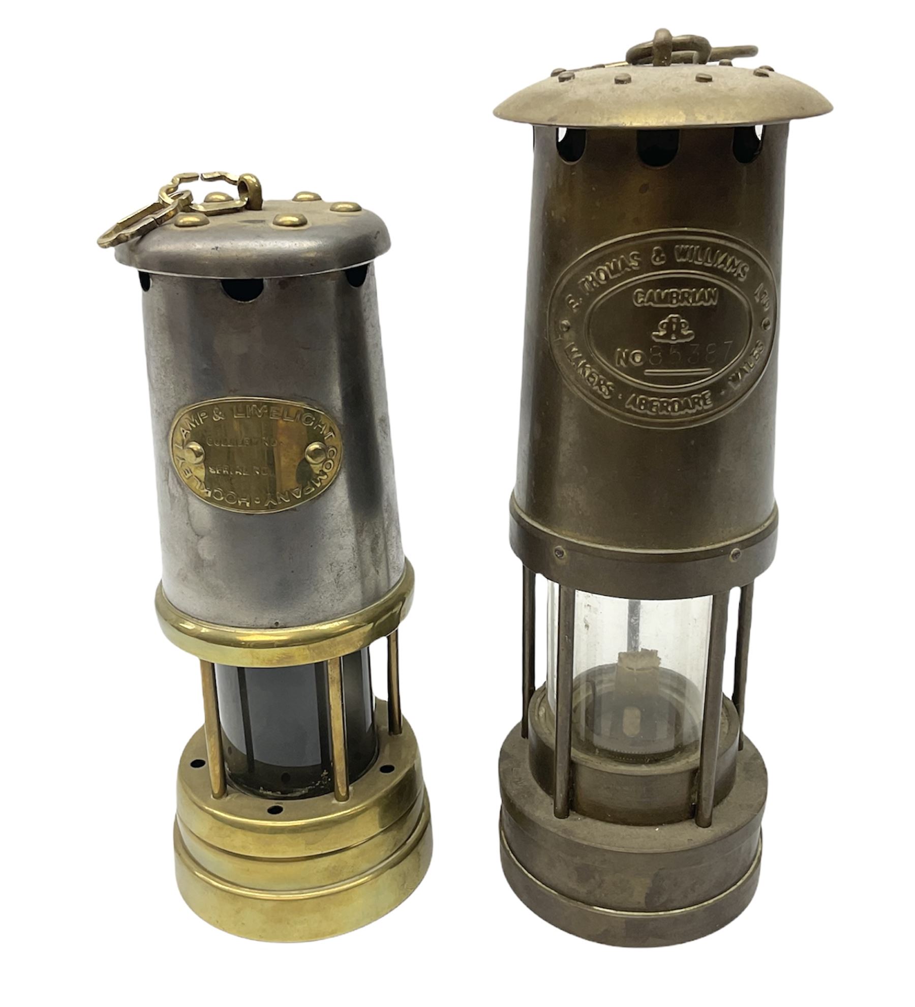 Two miners lamps comprising an E Thomas & Williams Ltd example and a Lamp & Limelight Company exampl