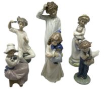 Lladro figure of a girl brushing her hair