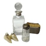 Two engine turned silver brushes and clear glass decanter with silver collar
