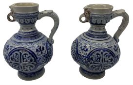 Pair of late 19th Century German Simon Peter Gerz salt glaze stone jugs