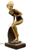 Art Deco style lamp in the form of a lady upon shaped bronzed effect plinth