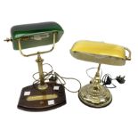 Bankers desk light with green glass shade on a wooden plinth