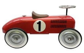 Child's red tin car in the form of a racing car