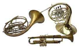 French horn marked 'hornblower 161' and another similar example