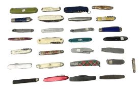 Twenty-nine pocket knives including commemorative and advertising examples