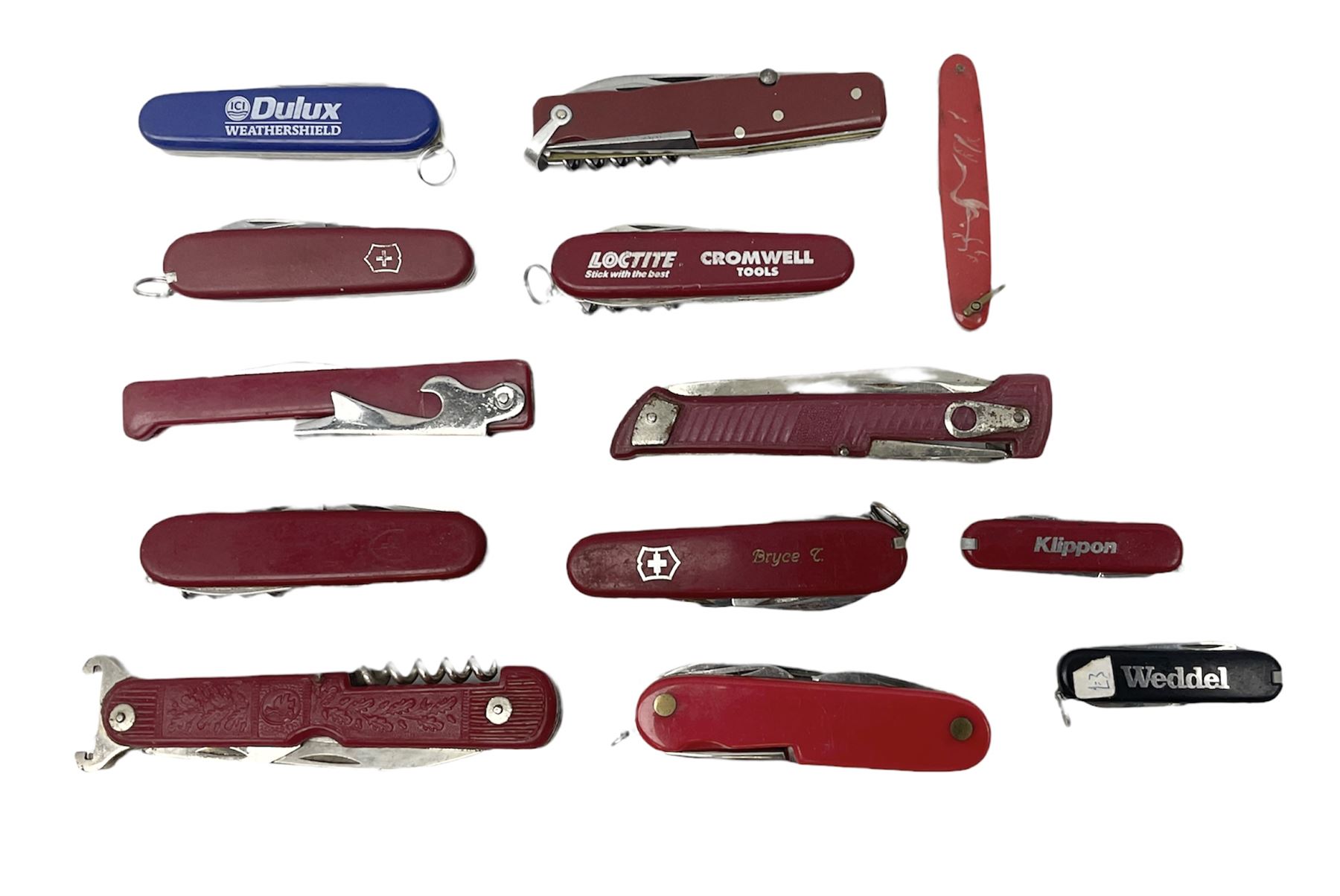 Thirteen pocket knives including Swiss Army knives and other similar examples