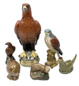 Four Beswick Beneagles Whisky decanters to include Golden Eagle and otter