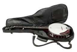 Remo Palmer four stringed Banjo in a soft case