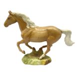 Beswick figure of cantering Palomino horse on base model no 1374
