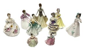 Eight Royal Doulton figures