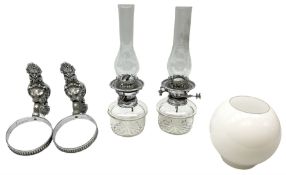 Pair of chrome mounted glass oil lamps