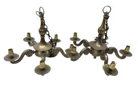 Pair of bronzed metal five-branch chandeliers