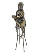 Art Deco style bronze modelled as a female figure with knee raised