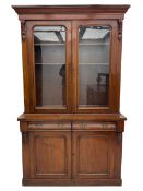 Victorian mahogany bookcase on cupboard