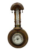 An Edwardian hall barometer with a compensated Aneroid movement by the German maker Julius Gischard