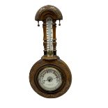 An Edwardian hall barometer with a compensated Aneroid movement by the German maker Julius Gischard