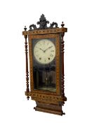 A late 19th century spring driven American Eight-day wall clock