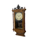 A late 19th century spring driven American Eight-day wall clock