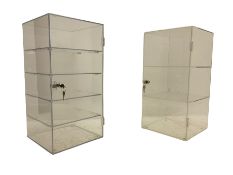 Two Perspex display cabinets