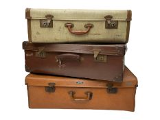 Three vintage suitcases