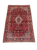 Persian red ground Kashan rug