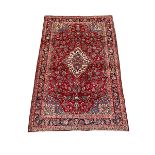 Persian red ground Kashan rug