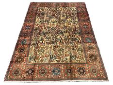 Persian ivory ground rug