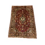 Persian Kashan deep red ground rug