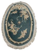 Chinese washed woollen oval dragon rug