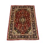 Persian red ground Kashan rug