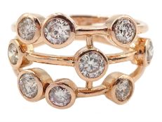 Rose gold nine stone round brilliant diamond contemporary design ring