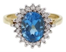 9ct gold diamond and oval blue topaz cluster ring