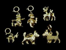 Six 9ct gold charms including two West Highland terriers