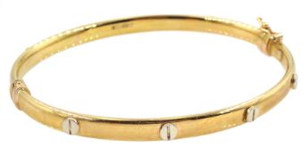 9ct gold hinged bangle with applied stud decoration