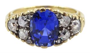 18ct gold oval synthetic sapphire and six stone old cut diamond ring