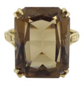 9ct gold single stone smoky quartz ring with textured shoulders