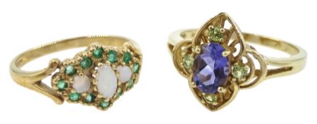 Gold three stone opal and emerald cluster ring and gold iolite and green stone open work design ring