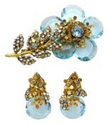 Miriam Haskell gilt blue crystal and paste stone set flower brooch and a similar pair of clip on ear
