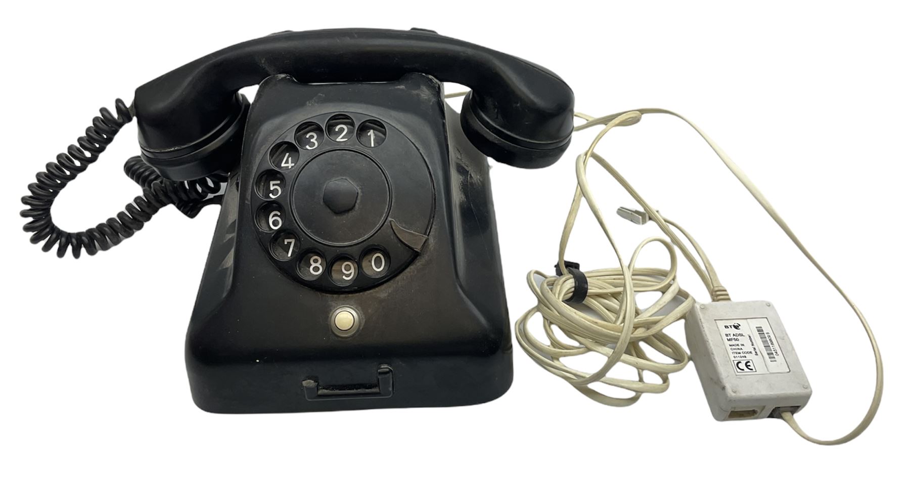 Black Bakelite telephone with rotary dial