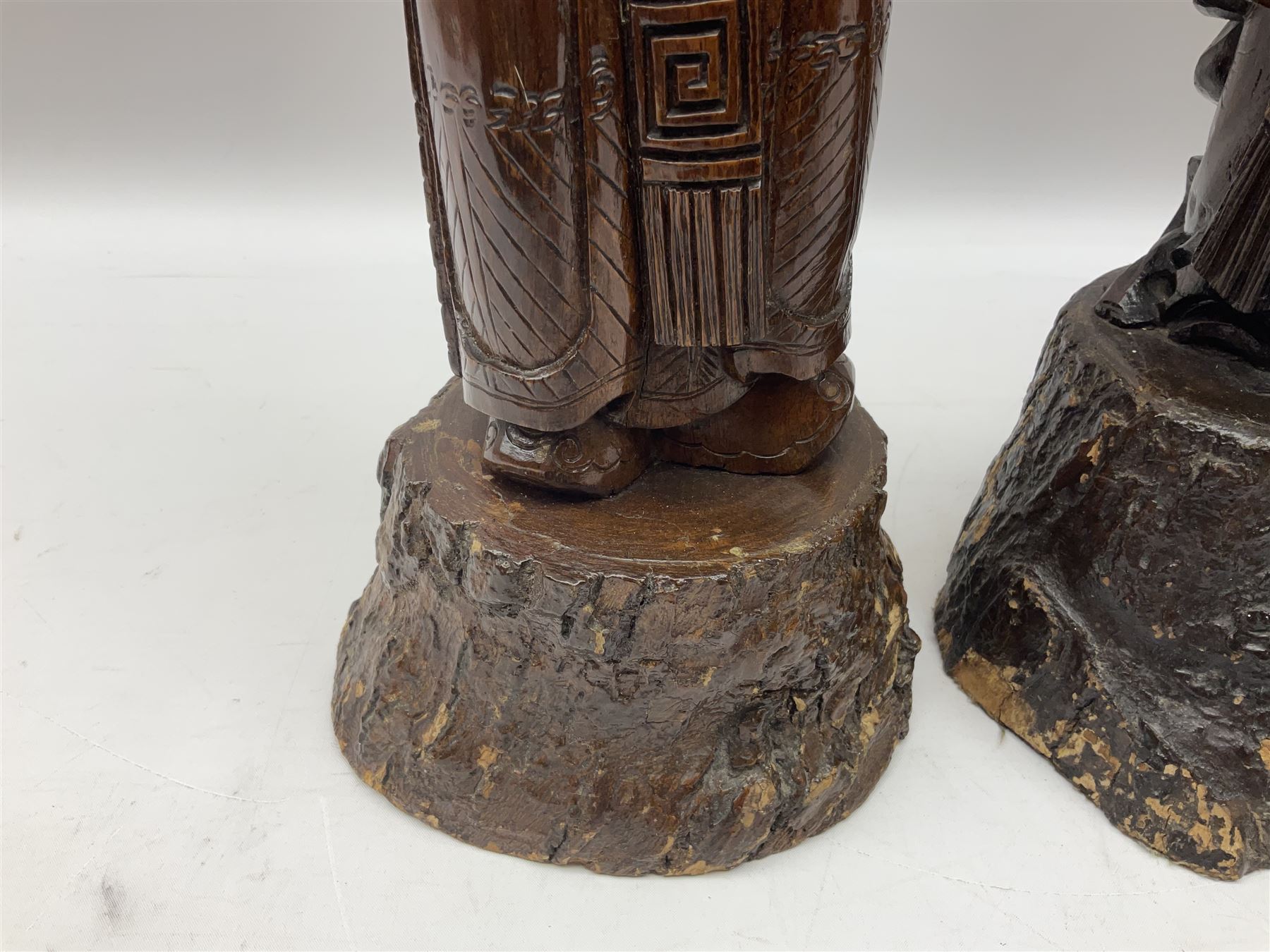 Two large hardwood Oriental figures carved as a man and woman donning robes upon naturalistic plinth - Image 5 of 19