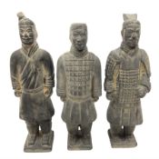 Three Chinese terracotta warrior style figures