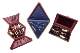 Three sets of sewing implements in fitted cases