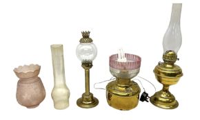 Three brass oil lamps