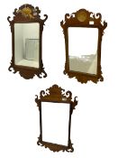 Three Chippendale style mahogany fretwork wall mirrors